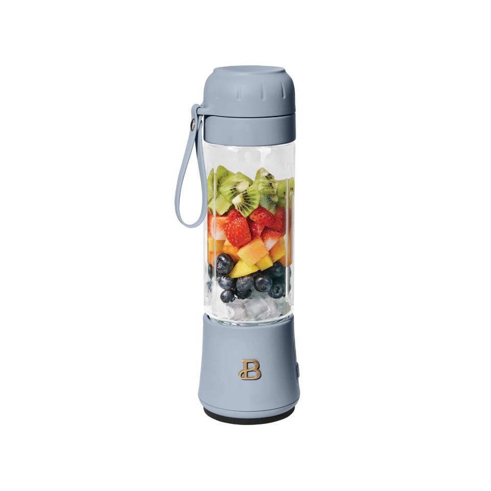 <p><a href="https://clicks.trx-hub.com/xid/hearstcorp_9eb67_ghk?q=https%3A%2F%2Fwww.walmart.com%2Fip%2FBeautiful-Portable-Blender-Cornflower-Blue-by-Drew-Barrymore-70-Watt-18-5-oz%2F839511600&p=https%3A%2F%2F&utmSource=yahoo-us&utmCampaign=65&utmMedium=syn" rel="nofollow noopener" target="_blank" data-ylk="slk:Shop Now;elm:context_link;itc:0;sec:content-canvas" class="link ">Shop Now</a></p><p>Beautiful 18.5-Ounce Portable Blender </p><p>walmart.com</p><p>$24.97</p>