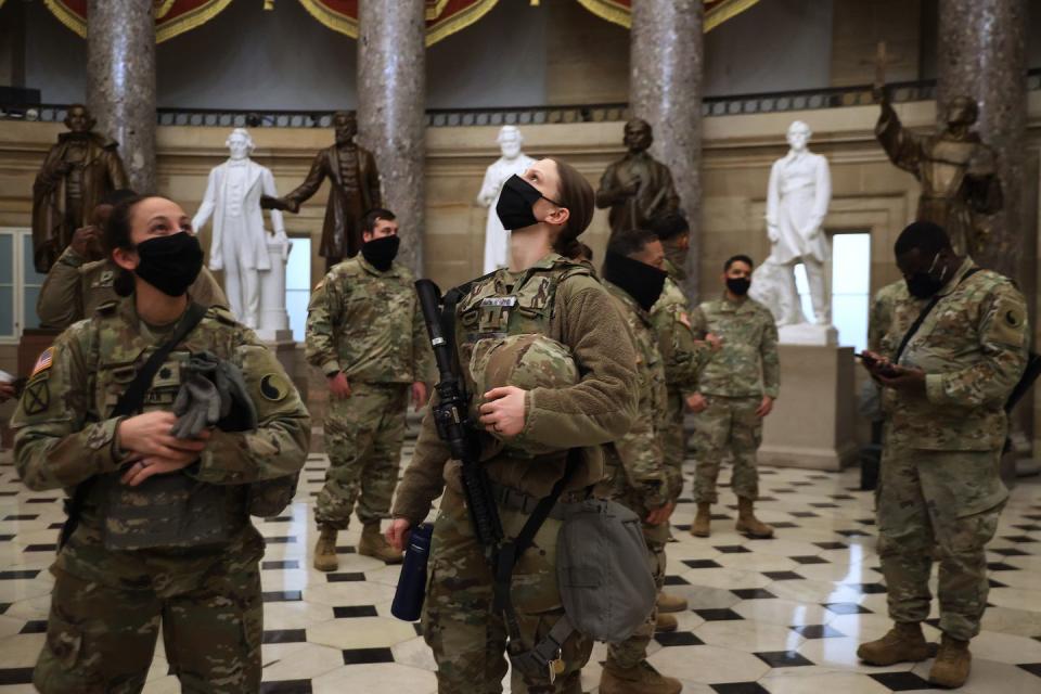 washington, dc january 13 exactly one week after a violent mob stormed through the us capitol, members of the virginia national guard tour statuary hall minutes after the house voted to impeach us president donald trump for the second time in little over a year in the house chamber of the us capitol january 13, 2021 in washington, dc the house voted 232 197 to impeach trump on the charge of “incitement of insurrection