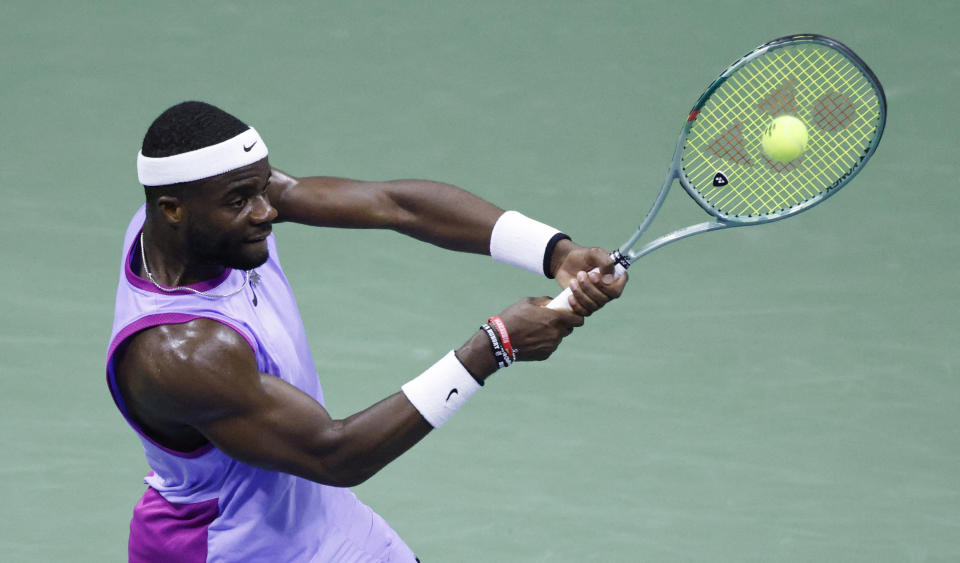 USA's Frances Tiafoe hits a return to Bulgaria's Grigor Dimitrov during their men's quarterfinals match on day nine of the US Open tennis tournament at the USTA Billie Jean King National Tennis Center in New York City, on September 3, 2024. (Photo by Kena Betancur / AFP) (Photo by KENA BETANCUR/AFP via Getty Images)