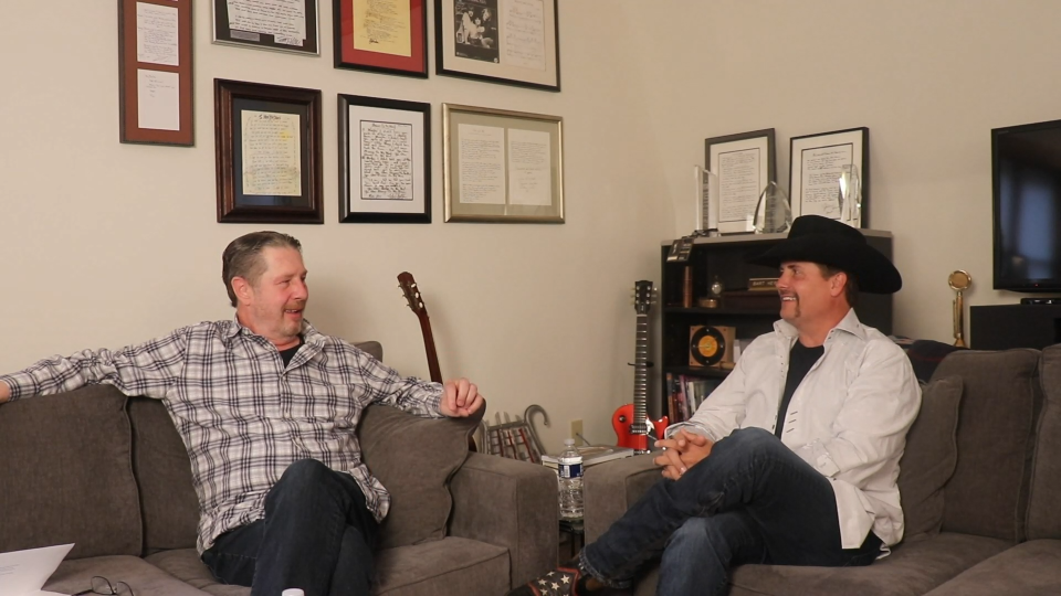 John Rich, right, speaks with Bart Herbison about songwriting.