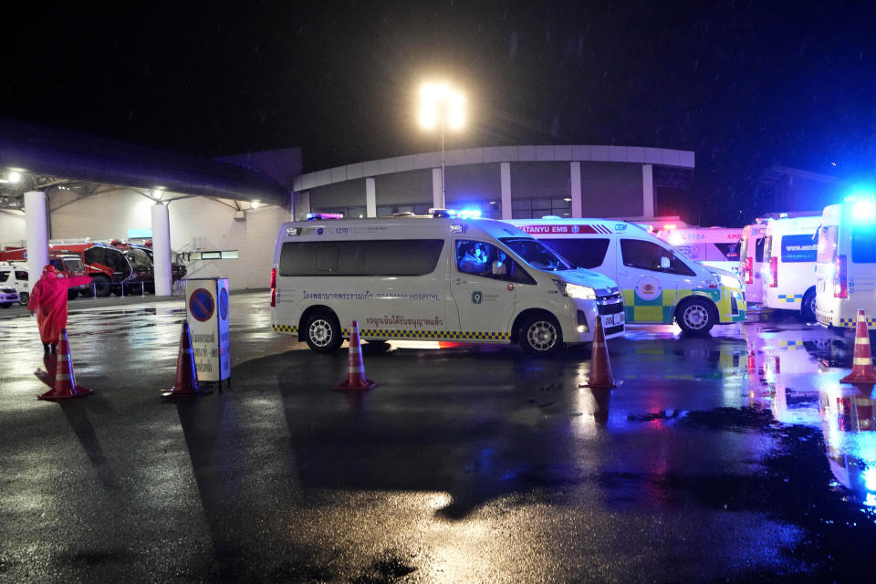 Ambulances wait to carry passengers from a London-Singapore flight that encountered severe turbulence, in Bangkok, Thailand, Tuesday, May 21, 2024. The plane apparently plummeted for a number of minutes before it was diverted to Bangkok, where emergency crews rushed to help injured passengers amid stormy weather, Singapore Airlines said Tuesday. (AP Photo/Sakchai Lalit)