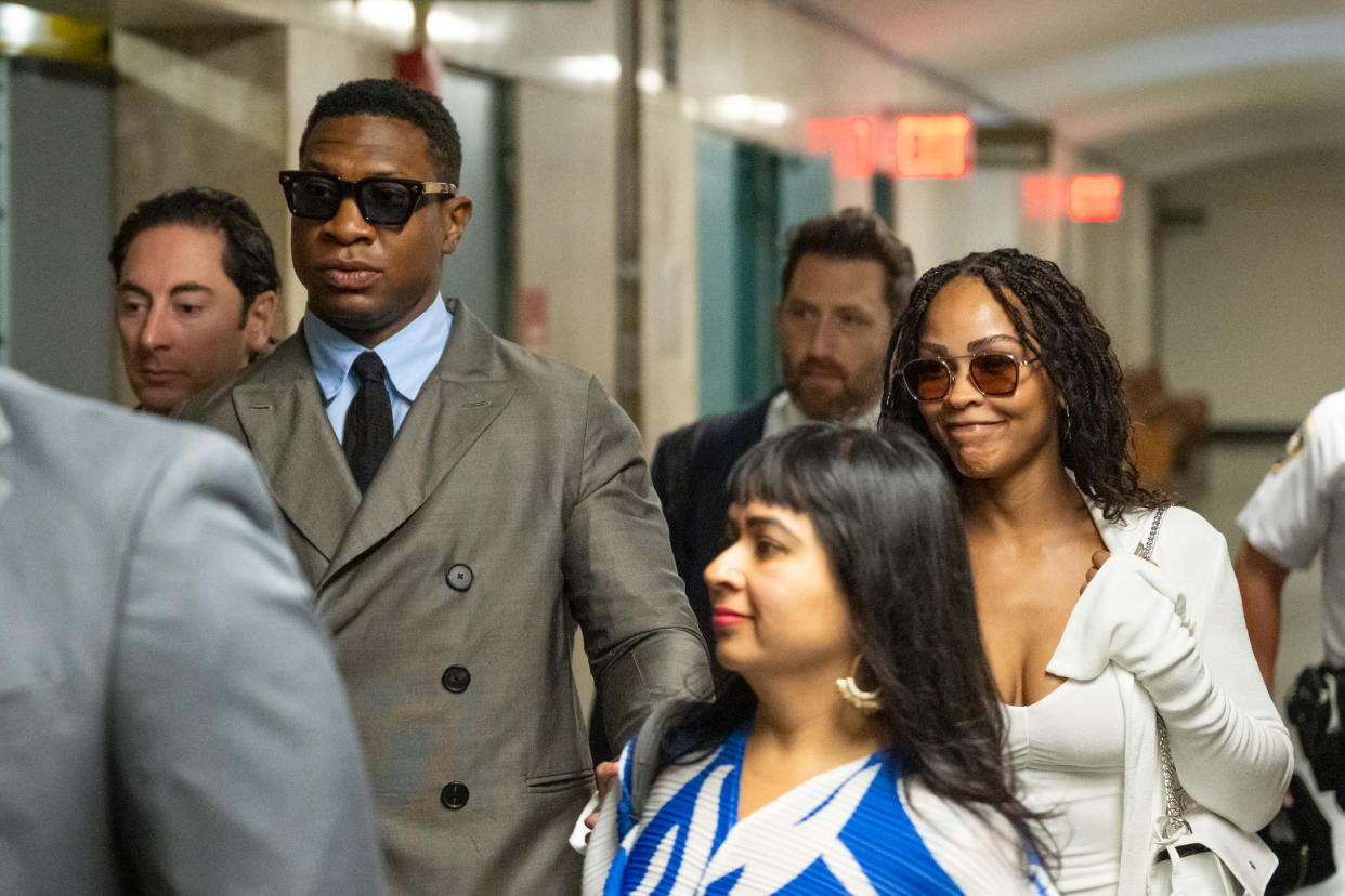 NEW YORK, NEW YORK - AUGUST 03: Actor Jonathan Majors, and his girlfriend, Megan Good, flanked by his lawyer Priya Chaudhry (R), arrive to Manhattan Criminal Court for his pre-trial hearing on August 03, 2023 in New York City. If convicted, Majors could face up to a year in jail over misdemeanor charges of assault and harassment. (Photo by Alexi Rosenfeld/Getty Images)