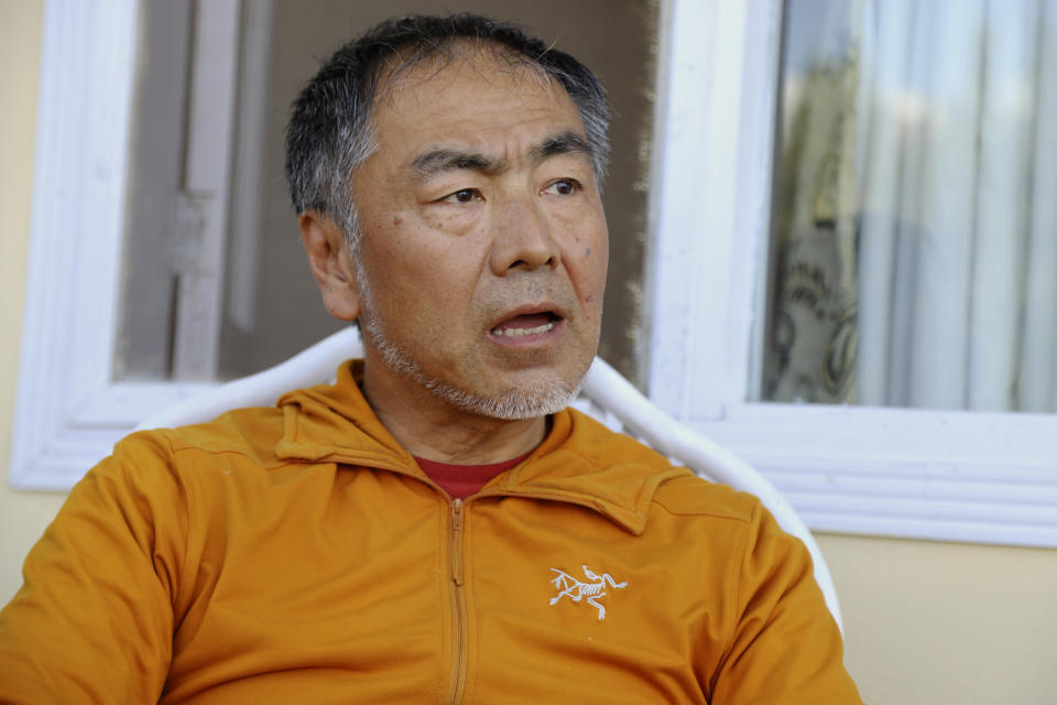 Japanese climber Semba Takayasu speaks with the Associated Press about the incident and death of his fellow climber Shinji Tamura, in Skardu, Pakistan, Tuesday, Aug. 15, 2023. Japanese climber Shinji Tamura died, and his fellow mountaineer Semba Takayasu was injured while trying to scale one of the highest and unscaled peaks in northern Pakistan last week, a mountaineering official and the injured climber said on Tuesday. (AP Photo/M.H. Balti)