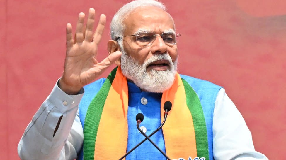 NEW DELHI, INDIA - APRIL 14: Prime Minister Narendra Modi during the launch of BJP's Sankalp Patra for Lok Sabha Elections 2024 at BJP HQ, on April 14, 2024 in New Delhi, India. BJP election manifesto - "'Sankalp Patra': One nation, one election and a common electoral roll system will be introduced." BJP also promised to introduce a law against exam paper leaks. (Photo by Sonu Mehta/Hindustan Times via Getty Images)