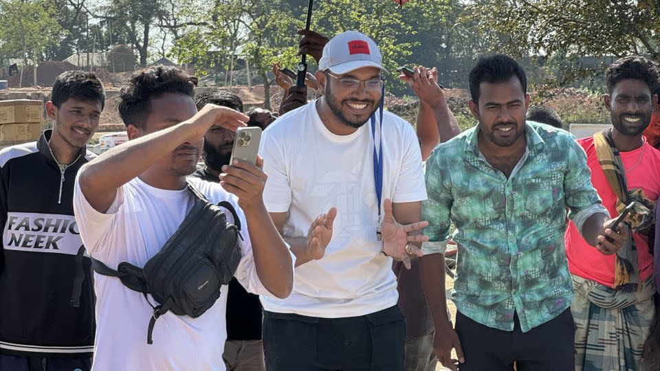 Somrat (center) is the creator of the games. He is pictured with his team on March 6, 2024 in Banwarinagar village in the Pabna District. - Courtesy Omar Sunny Somrat/SS Food Challenge