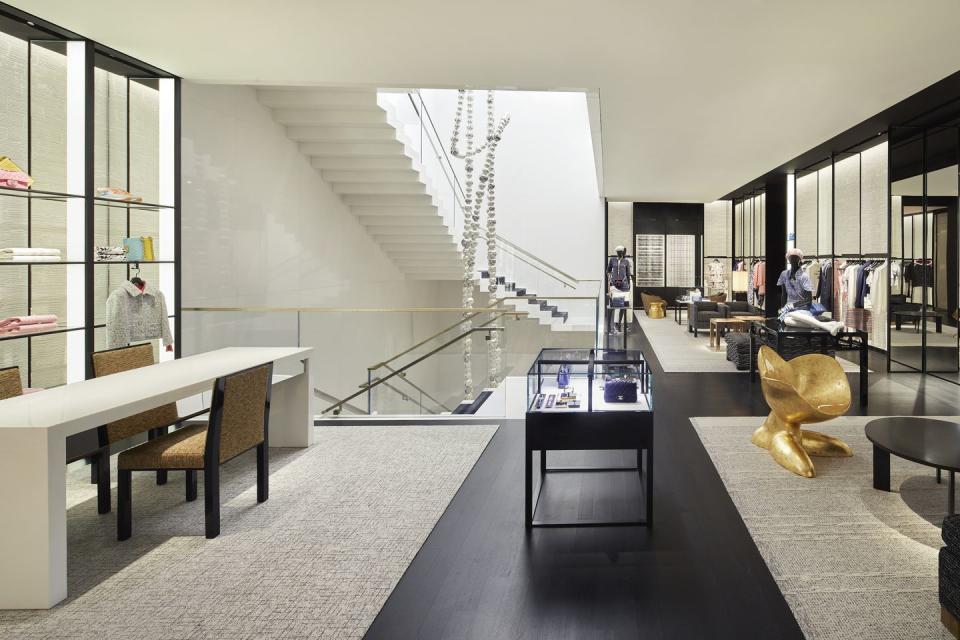 <p>Marino used beige textured fabrics for the carpet and seating to contrast the marble walls and matte finishes. </p>