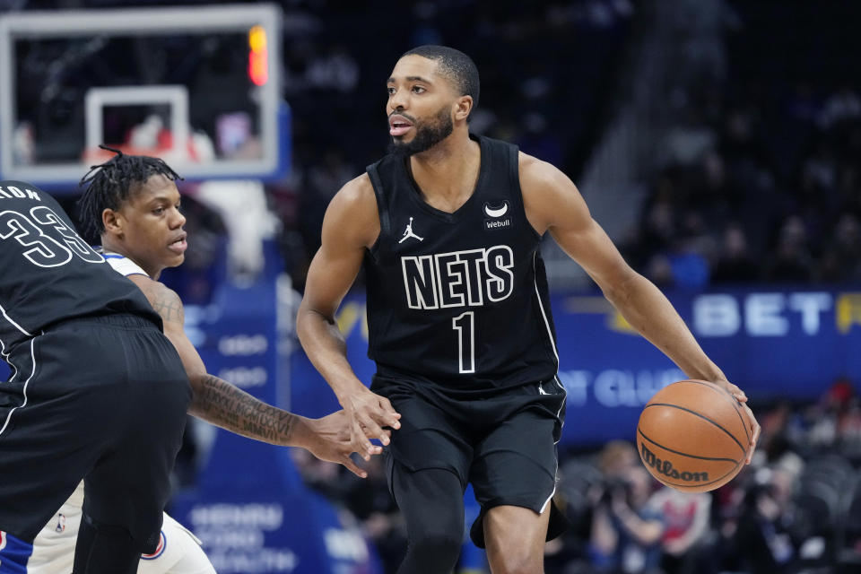 Brooklyn Nets forward Mikal Bridges (1) brings the ball up court during the first half of an NBA basketball game against the Detroit Pistons, Thursday, March 7, 2024, in Detroit. (AP Photo/Carlos Osorio)