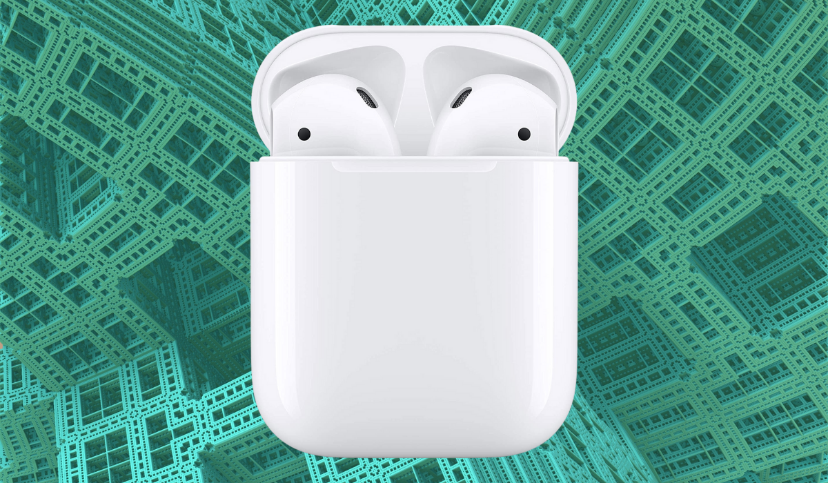 White Apple AirPods in their white wireless charging case
