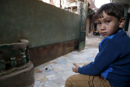 Mohamed, son of Amr Abushanab, who died in police custody, is pictured during an interview with Reuters at their family house in Tahanoub village, Egypt, November 30, 2015. REUTERS/Amr Abdallah Dalsh