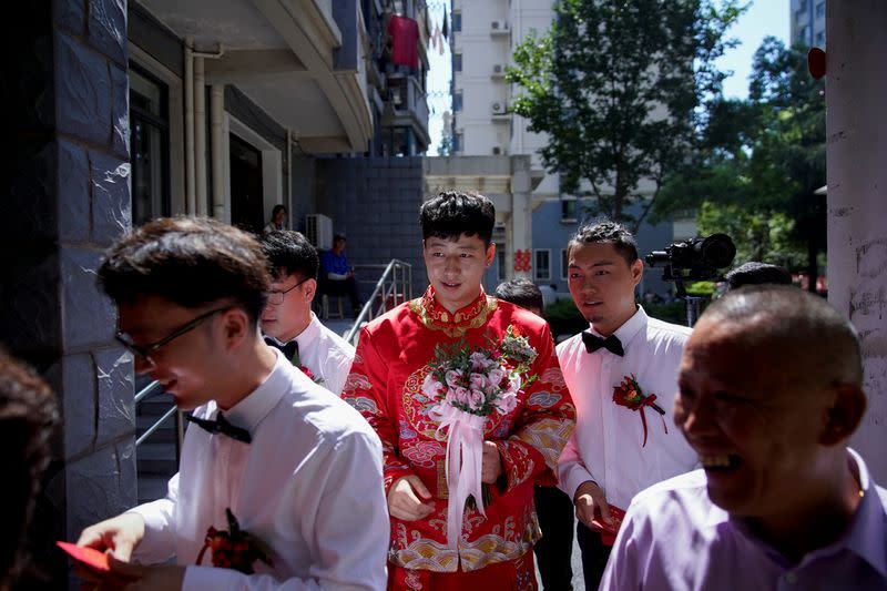 The Wider Image: Coronavirus dampens celebrations in China's wedding gown city