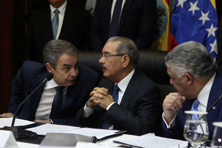 Former Spanish Prime Minister Jose Luis Rodriguez Zapatero, Dominican Republic's President Danilo Medina and Chancellor Miguel Vargas attend Venezuelan government and opposition meeting in Santo Domingo, Dominican Republic December 2, 2017. REUTERS/Ricardo Rojas