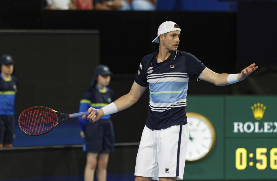 John Isner of the United States reacts during his match against Russsia's Daniil Medvedev at the ATP Cup in Perth, Australia, Sunday, Jan. 5, 2020. (AP Photo/Trevor Collens)