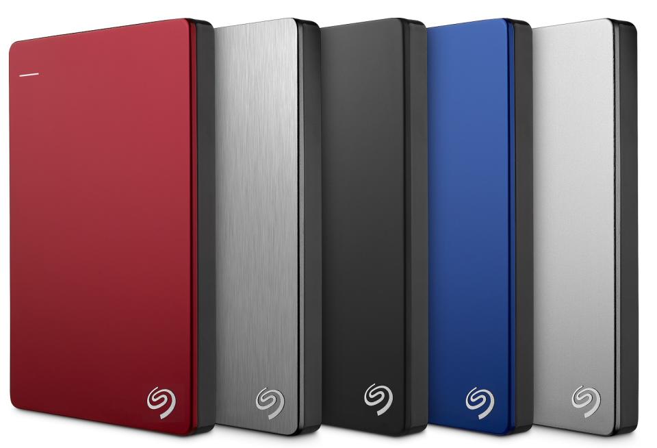 A lineup of five Seagate hard disk drives in various colors