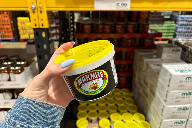 Photo shows Emily holding the Marmite