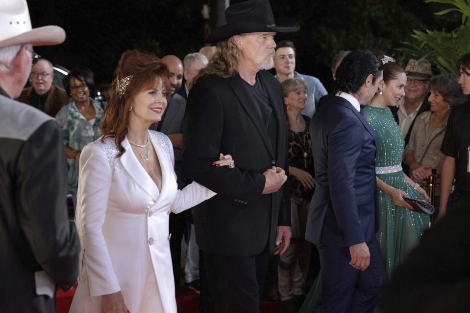 This image released by FOX shows Susan Sarandon, left, and and Trace Adkins in the series premiere of "Monarch," debuting this fall. (FOX via AP)