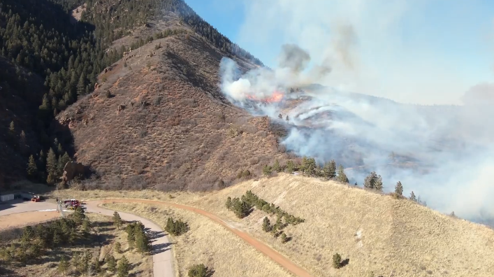 Courtesy: CSFD, crews show view from drone of wildfire burning on USAFA