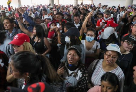 People gather in the aftermath of the last days' protests, after the government of Ecuadorian President Lenin Moreno agreed to repeal a decree that ended fuel subsidies, in Quito