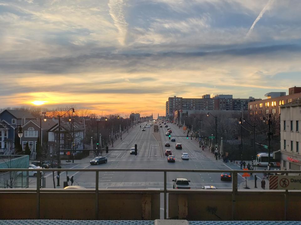 view of the sunset from an L platform in Chicago