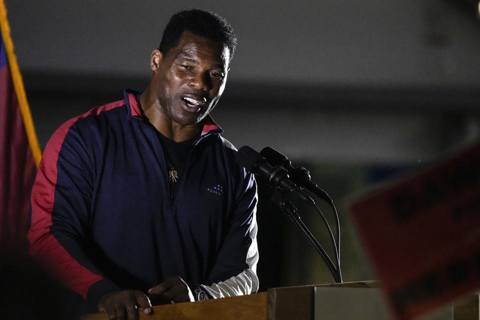 Republican nominee for U.S Senate Herschel Walker speaks during a campaign rally on Thursday, Nov. 10, 2022, in Canton, Ga.. Walker is in a runoff with incumbent Democrat Raphael Warnock. (AP Photo/John Bazemore)