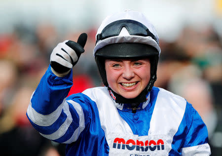 FILE PHOTO: Horse Racing - Cheltenham Festival - Cheltenham Racecourse, Cheltenham, Britain - March 14, 2019 Bryony Frost celebrates winning the 2.50 Ryanair Chase. REUTERS/Eddie Keogh