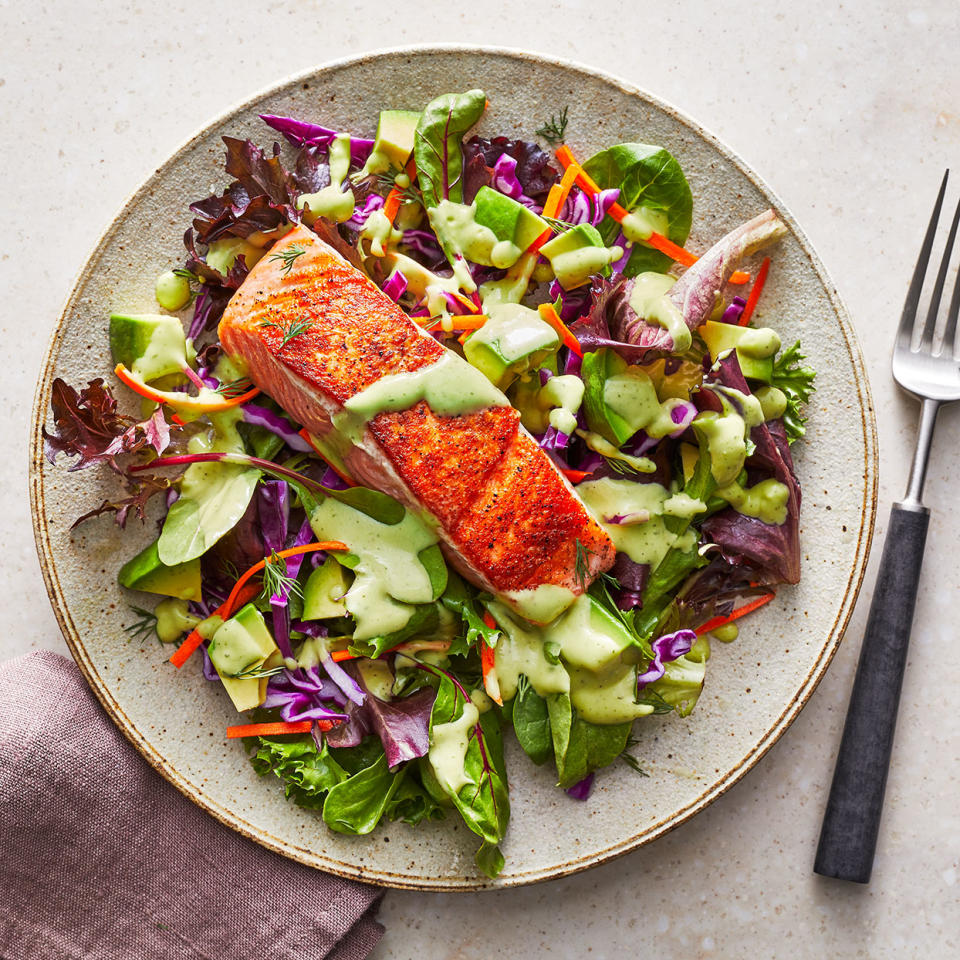 <p>Tender salmon tops a hearty salad of red cabbage, carrots and avocados tossed with a creamy dill vinaigrette in this quick, easy dinner. <a href="https://www.eatingwell.com/recipe/7870123/salmon-avocado-salad/" rel="nofollow noopener" target="_blank" data-ylk="slk:View Recipe;elm:context_link;itc:0;sec:content-canvas" class="link ">View Recipe</a></p>