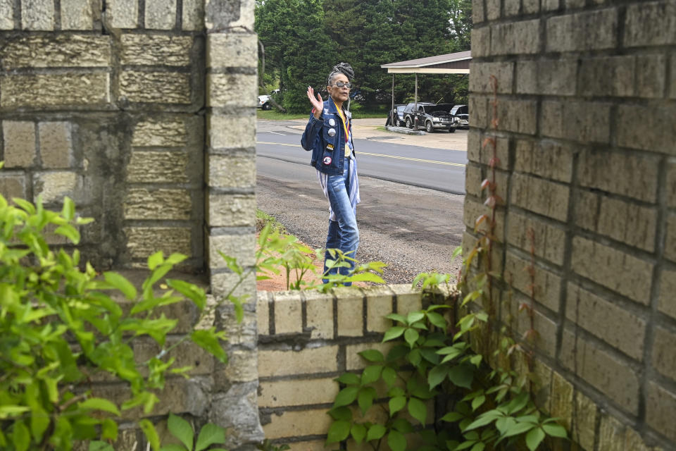 Civil Rights foot soldier Della Simpson Maynor retraces her steps on May 19, 2023, from the night she was clubbed by police on Feb. 18, 1965, at the scene of a confrontation outside Zion Church in Marion, Alabama. Maynor was 14-years-old at the time and was part of a group planning to march to the Perry County jail where a local SCLC field secretary was being held for registering voters. She also heard the gunshots that fatally wounded activist Jimmie Lee Jackson. (AP Photo/Julie Bennett)