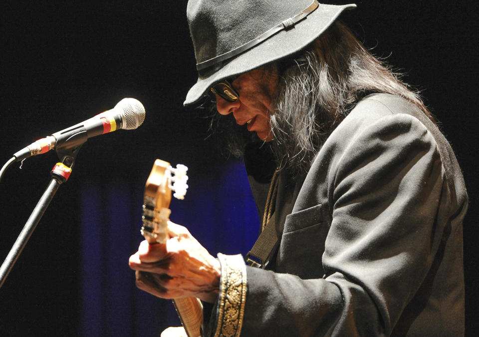 FILE - Singer-songwriter Sixto Rodriguez performs at the Beacon Theatre on April 7, 2013, in New York. Rodriguez, who became the subject of the Oscar-winning documentary “Searching for Sugarman” has died, according to the Sugarman.org website on Tuesday, Aug. 8, 2023, and confirmed Wednesday by his granddaughter. He was 81. (Photo by Evan Agostini/Invision/AP, File)