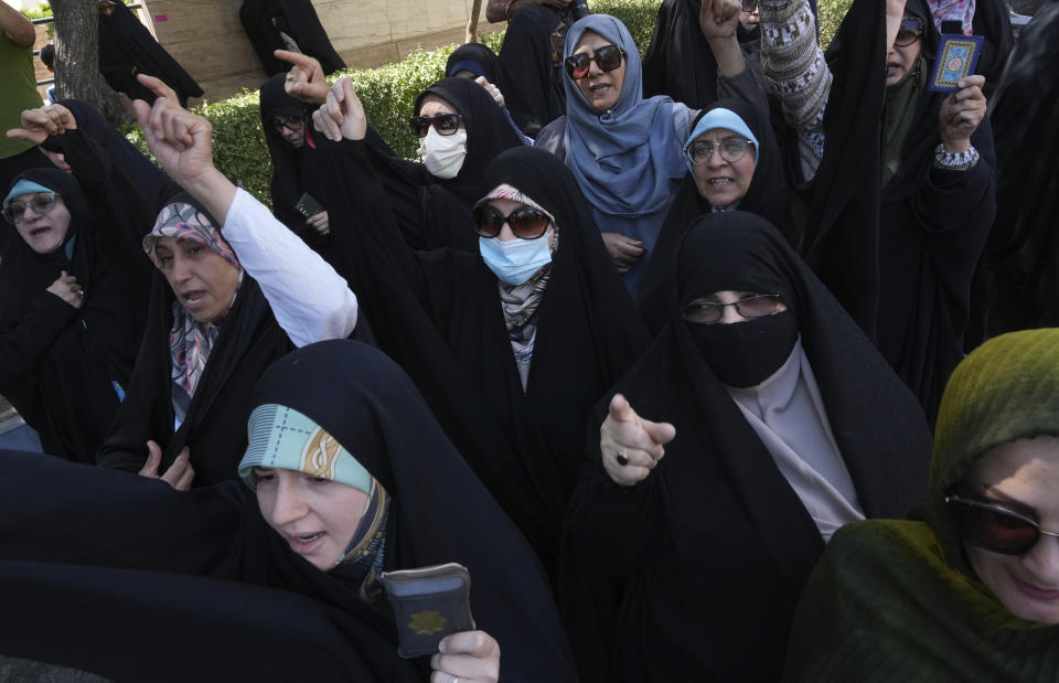 Iranian demonstrators chant slogans during a protest of the burning of a Quran in Sweden, in front of the Swedish Embassy in Tehran, Iran, Friday, June 30, 2023. On Wednesday, a man who identified himself in Swedish media as a refugee from Iraq burned a Quran outside a mosque in central Stockholm. (AP Photo/Vahid Salemi)