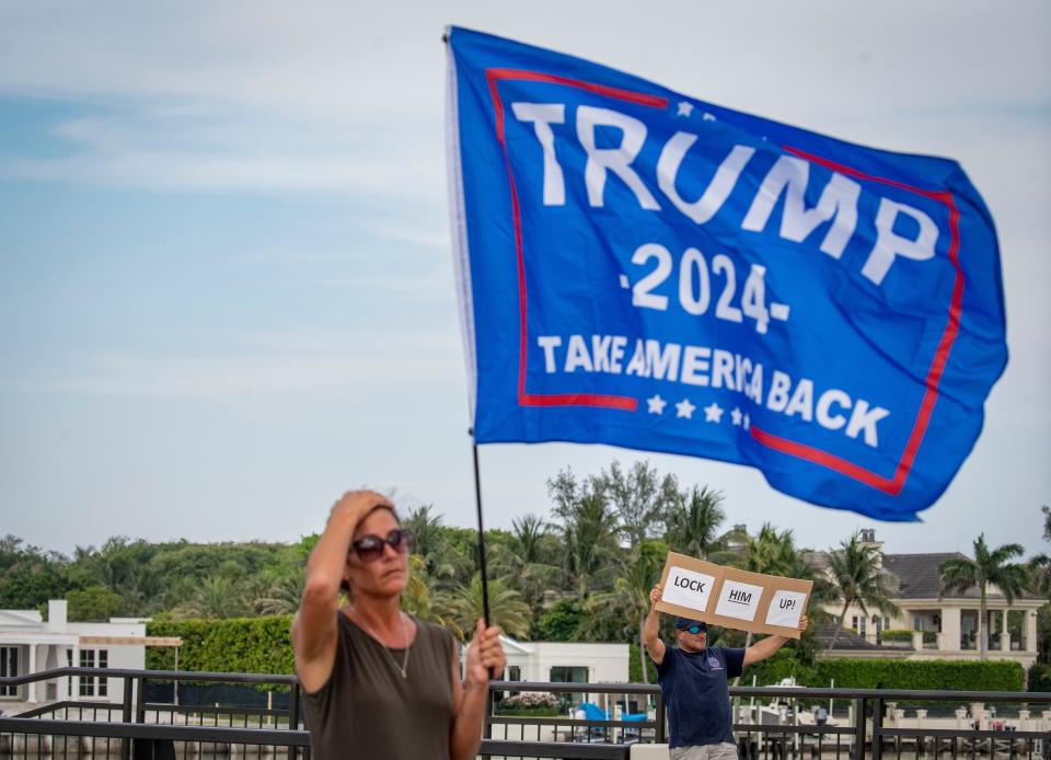 Former President Donald Trump's supporters show their support near his Mar-a-Lago estate on May 30, 2024, in Palm Beach, Fla., after he was found guilty in his criminal trial in New York City.