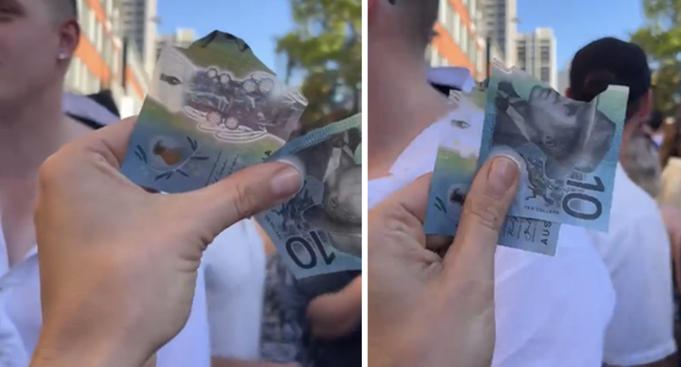 Photo that shows a $10 note ripped in half