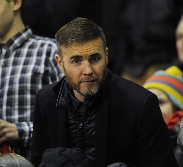Gary Barlow watches the Barclays Premier League match between Liverpool and Swansea City at Anfield on December 29, 2014 in Liverpool, England.  (Photo by John Powell/Liverpool FC via Getty Images)