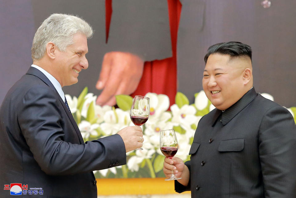 In this Sunday, Nov. 4, 2018 photo released by the North Korean government, Cuban President Miguel Diaz-Canel, left, and North Korean leader Kim Jong Un raise glasses for a toast during a welcome banquet in Pyongyang, North Korea. Both, hoping to get out from under U.S. economic sanctions, agreed to expand and strengthen their strategic relations, North Korea's state media reported Monday, Nov. 5, 2018. Independent journalists were not given access to cover the event depicted in this image distributed by the North Korean government. The content of this image is as provided and cannot be independently verified. Korean language watermark on image as provided by source reads: "KCNA" which is the abbreviation for Korean Central News Agency. (Korean Central News Agency/Korea News Service via AP)