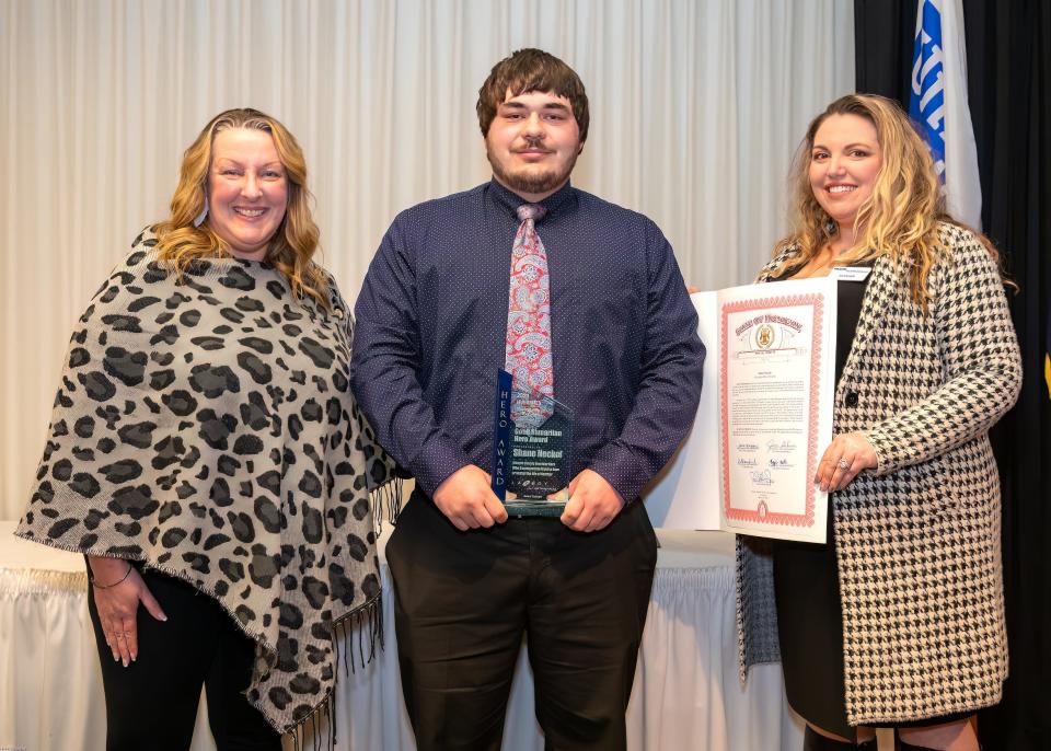 Pictured is Kerri Williams, left, Adult Good Samaritan Hero Shane Neckel and Ashleigh Glass.