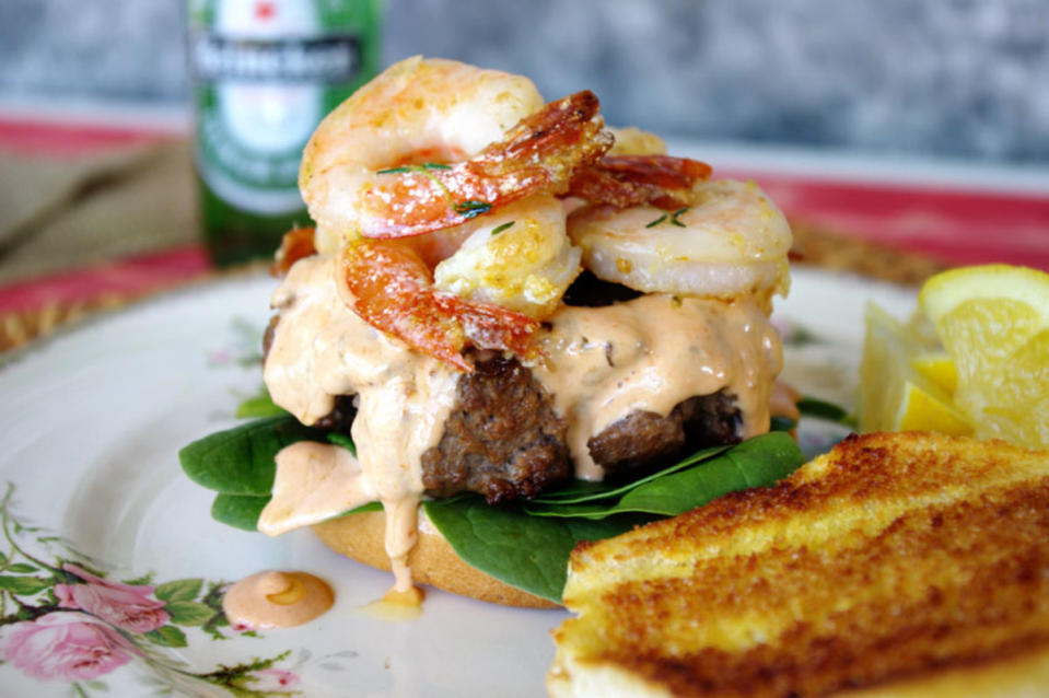 <p>Shea Goldstein</p><p>This is like a great surf 'n' turf in a bun!</p><p><strong>Get the recipe: <a href="https://parade.com/841661/sheagoldstein/shrimp-scampi-burger-its-crazy-but-amazing/" rel="nofollow noopener" target="_blank" data-ylk="slk:Shrimp Scampi Burger;elm:context_link;itc:0;sec:content-canvas" class="link ">Shrimp Scampi Burger</a></strong></p>