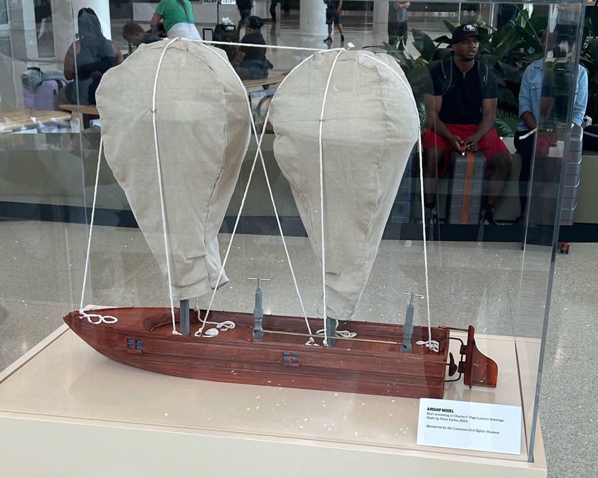 Two airship models were created by artist Peter Excho using Charles Page’s patented drawings. One is in the airport’s exhibit and the other at the Ernest N. Morial Convention Center. This was the first time his grandson Joseph Page had seen a model made of the airship using his grandfather's drawings.