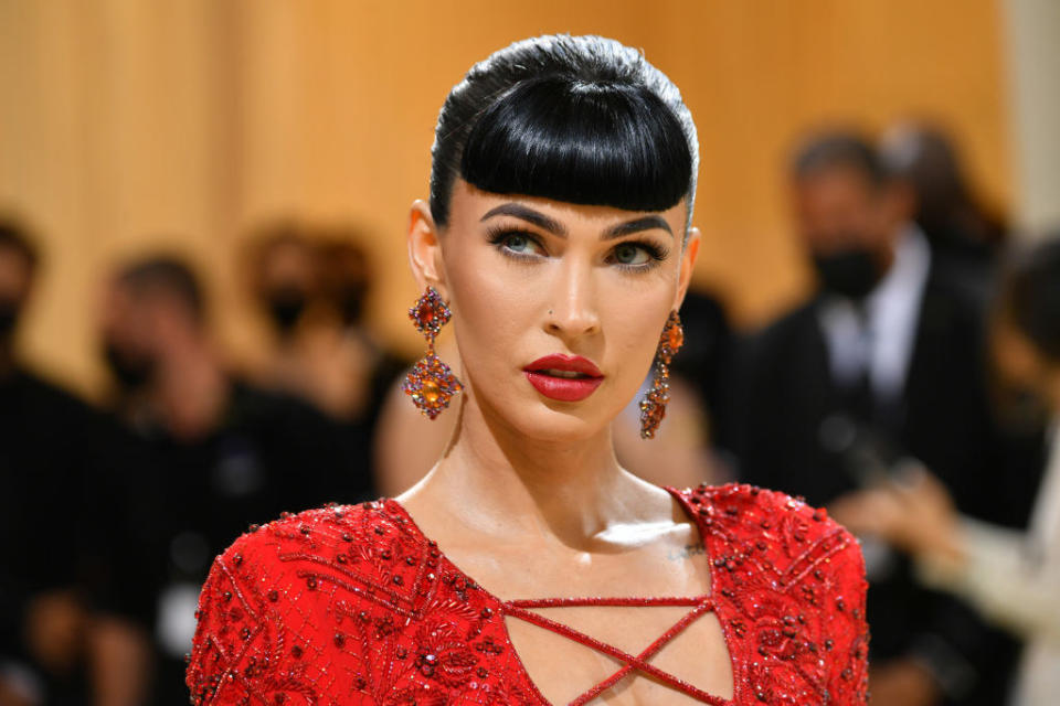 I simply lack the vocabulary to properly articulate the depths of my obsession with this look. With a pin-up homage hairstyle by Kim Kardashian's go-to hairstylist Andrew Fitzsimons and Lorraine Schwartz earrings (oh, and Megan's God-given face), I can only describe this glam as flawless.