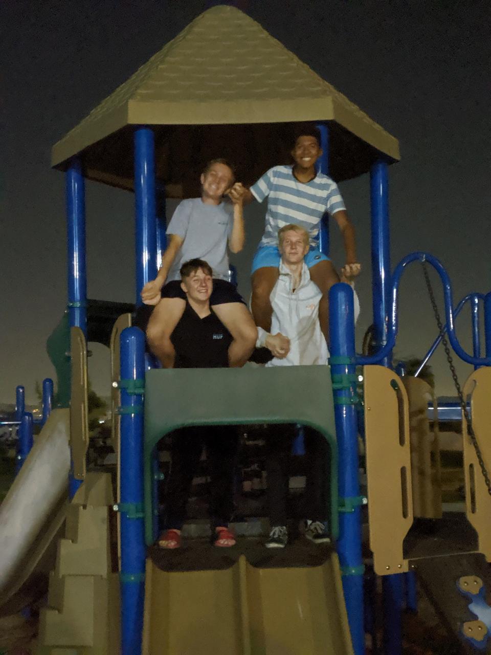 An October, 2019 photo shows Jacob Ivascu and Sergio Campusano sitting on the shoulders of Drake Ruiz and Daniel Hawkins during a youth event organized by Northpoint Evangelical Free Church of Corona, California.