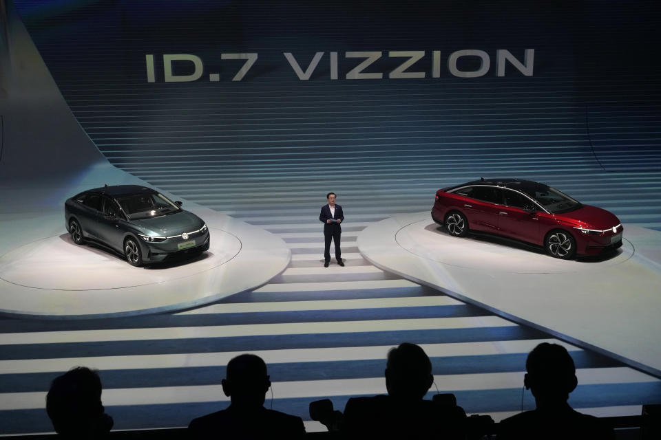 Volkswagen's ID.7 Vizzion, its new electric flagship sedan, is unveiled in a world premiere on the eve of the Auto Shanghai 2023 show in Shanghai, China, Monday, April 17, 2023. Global and Chinese automakers plan to unveil more than a dozen new electric SUVs, sedans and muscle cars this week at the Shanghai auto show, their first full-scale sales event in four years in a market that has become a workshop for developing electrics, self-driving cars and other technology. (AP Photo/Ng Han Guan)