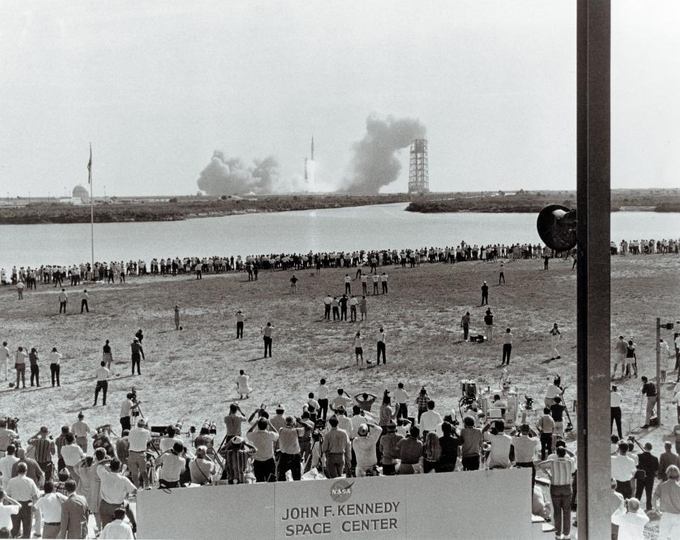 This NASA handout picture taken on July 16, 1969, shows some of the thousands of people who camped out on beaches and roads adjacent to the Kennedy Space Center to watch the Apollo 11 mission Liftoff aboard the Saturn V rocket. (Photo: NASA/AFP/Getty Images)