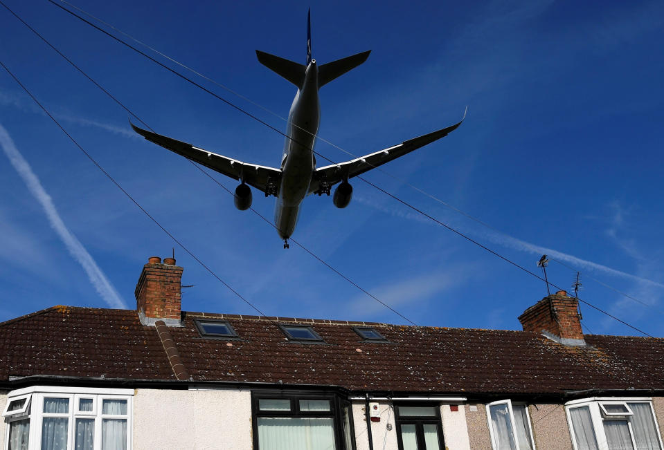 A passenger plane comes in to land at London Heathrow airport, which posts its first-half results following the outbreak of the coronavirus disease (COVID-19), in London, Britain, July 29, 2020. REUTERS/Toby Melville     TPX IMAGES OF THE DAY