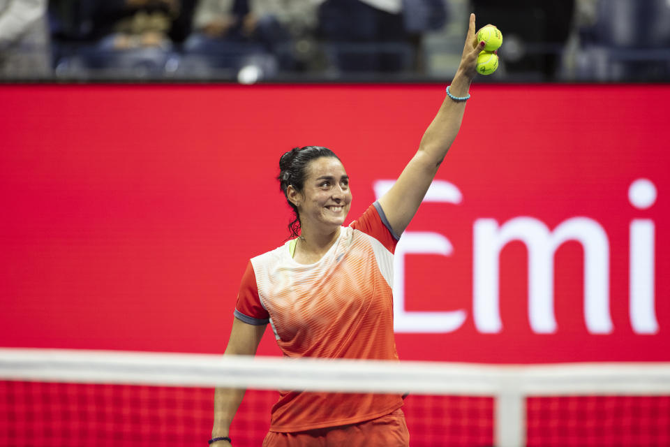 NEW YORK, USA, September 08:  Ons Jabeur of Tunisia prepares to hit balls into the crowd after her victory against Caroline Garcia of France in the Women's Singles Semi-Final match on Arthur Ashe Stadium during the US Open Tennis Championship 2022 at the USTA National Tennis Centre on September 8th 2022 in Flushing, Queens, New York City.  (Photo by Tim Clayton/Corbis via Getty Images)