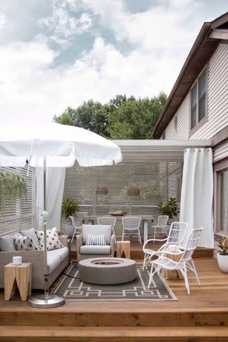 <p><a href="https://abeautifulmess.com/tips-for-decorating-an-outdoor-living-space/" data-component="link" data-source="inlineLink" data-type="externalLink" data-ordinal="1">A Beautiful Mess</a></p>