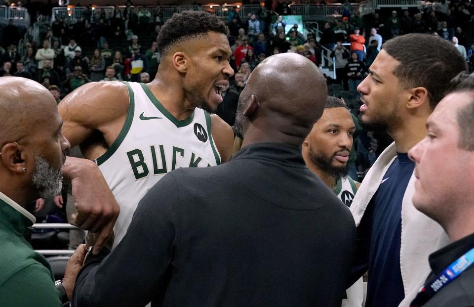 Milwaukee Bucks forward Giannis Antetokounmpo, left, exchanges words with Indiana Pacers guard Tyrese Haliburton after their game on Dec. 13 at Fiserv Forum. 



Mark Hoffman/Milwaukee Journal Sentinel