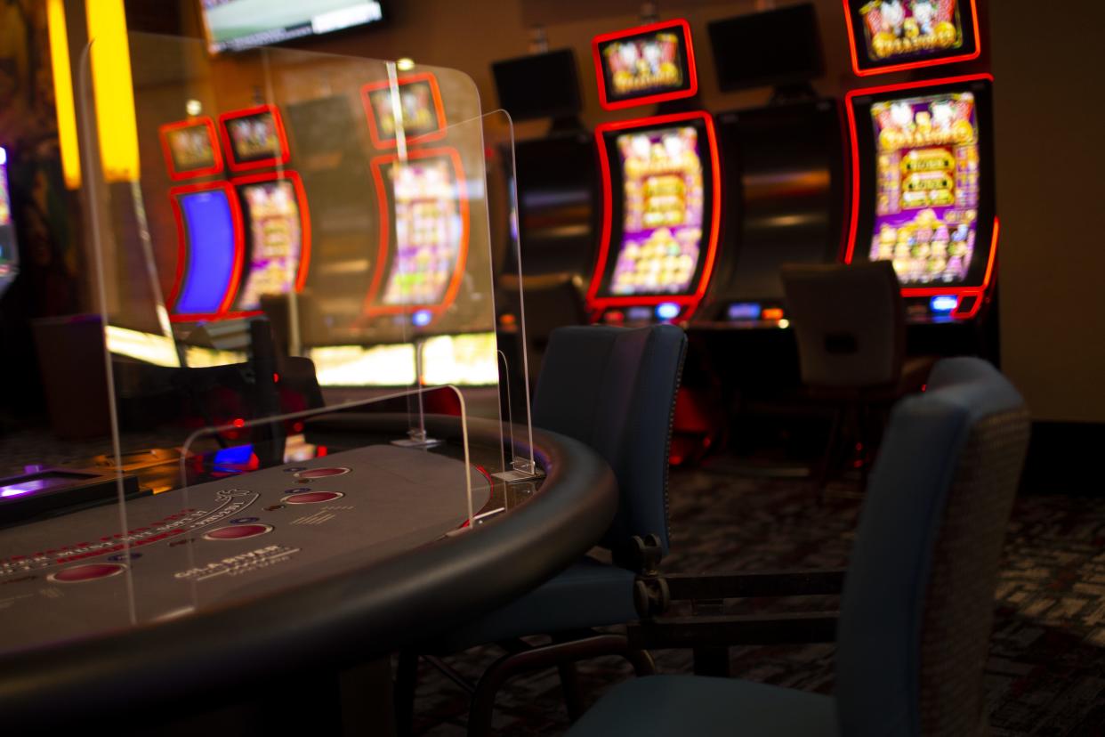 Plexiglas is placed around slot machines, gaming tables, and other areas at the Lone Butte Casino in Chandler on May 14, 2020. Casinos under the Gila River Indian Community were planning to reopen during the COVID-19 pandemic with new safety measures on May 15, 2020.