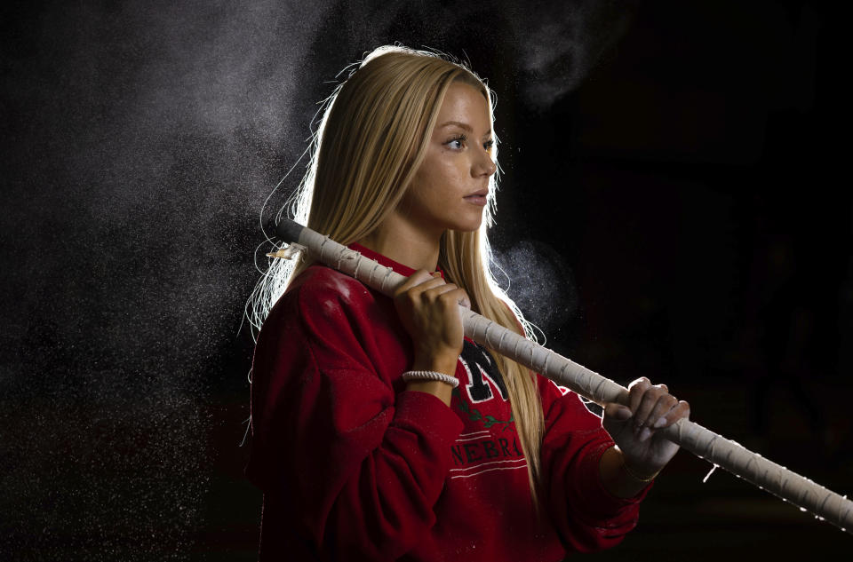 Nebraska NCAA college pole vaulter Jessica Gardner poses Thursday, March 9, 2023, in Lincoln, Neb. As has been the case with other female athletes who are monetizing their social media followings, it's typical for her looks to be the subject of comments on her videos, comments that can range from genuinely complimentary to inappropriate — or worse. (AP Photo/Rebecca S. Gratz)