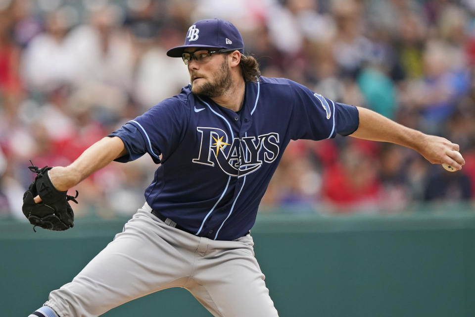 Tampa Bay Rays starting pitcher Josh Fleming delivers in the first inning of the team's baseball game against the Cleveland Indians, Friday, July 23, 2021, in Cleveland. (AP Photo/Tony Dejak)