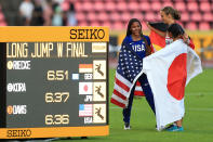 <p>Tara Davis of The USA, Lea-Jasmin Riecke of Germany and Ayaka Kora of Japan celebrate after winning medals in the final of the women's long jump on day four of The IAAF World U20 Championships on July 13, 2018 in Tampere, Finland. (Photo by Stephen Pond/Getty Images for IAAF)</p> 