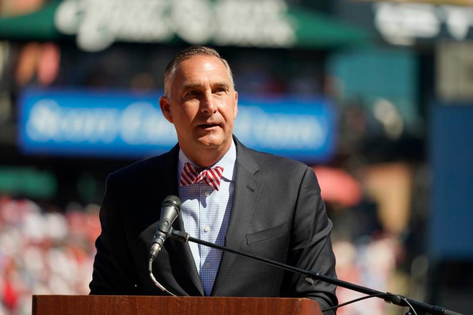 St. Louis Cardinals president of baseball operations John Mozeliak speaks as St. Louis Cardinals’ Albert Pujols (5) and Yadier Molina (4) are honored during a ceremony before the start of the final regular season game Oct. 22, 2022. The 2023 Cardinals are in last place, but Mozeliak said the team does not plan to be sellers at the trade deadline.