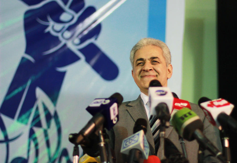 Egypt's presidential candidate Hamdeen Sabahi watches his supporters from a podium during his campaign in Mahalla, 125 kilometers (about 77 miles) north of Cairo, Egypt, Monday, May 5, 2014. Leftist politician Sabahi, a third-place finisher in the 2012 election won by Islamist Mohammed Morsi, who was ousted last year, is the only opponent running against former army chief Abdel-Fattah el-Sissi. (AP Photo/Mostafa el-Shemy)