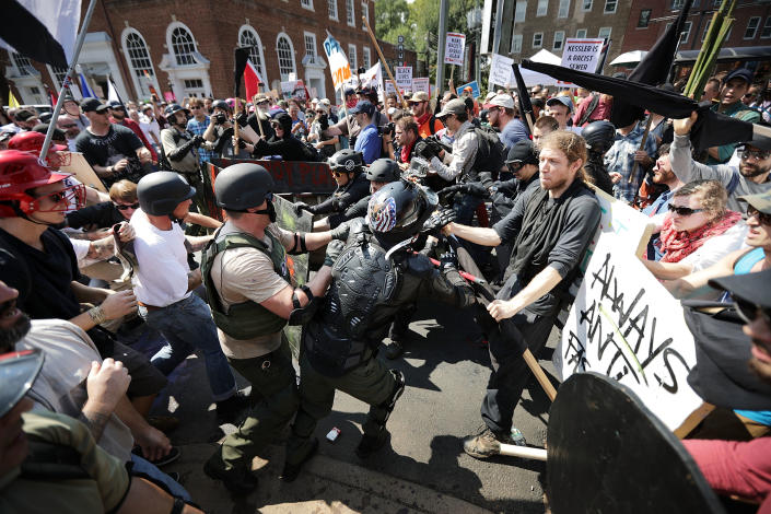 <p>White nationalists, neo-Nazis and members of the “alt-right” clash with counter-protesters as they enter Lee Park during the “Unite the Right” Aug.12, 2017 in Charlottesville, Va. (Photo: Chip Somodevilla/Getty Images) </p>